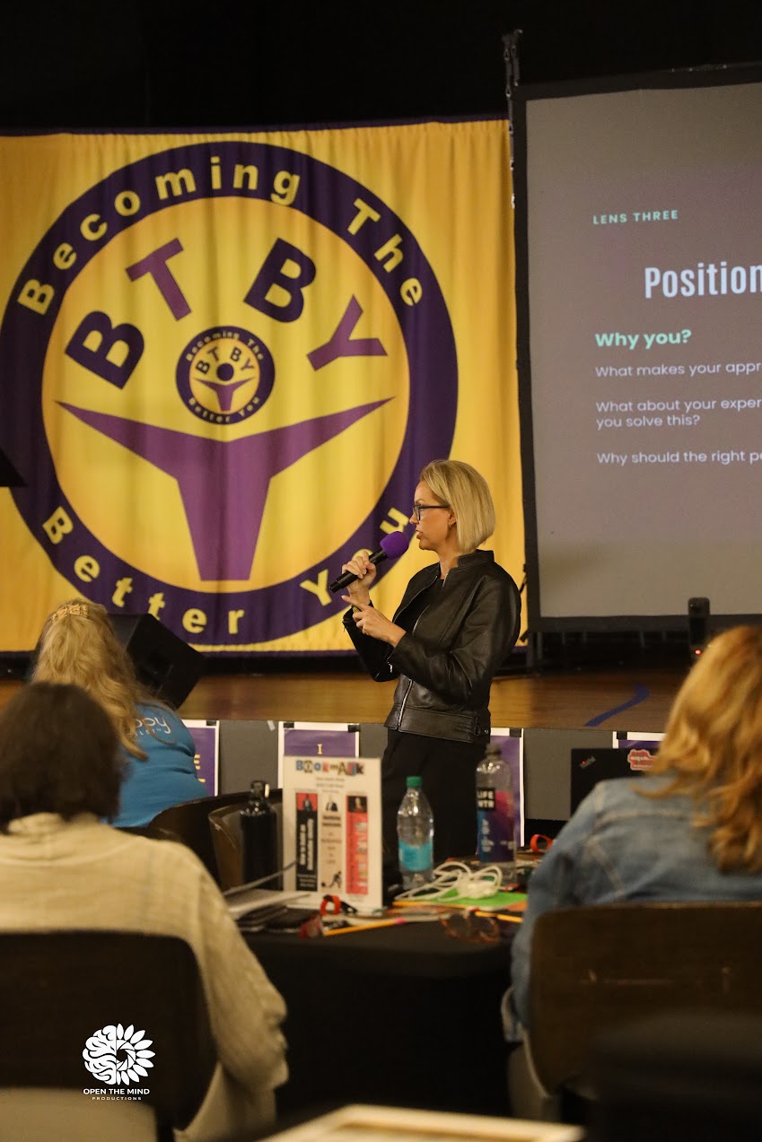 Stacy Raske in a working conversation with an audience